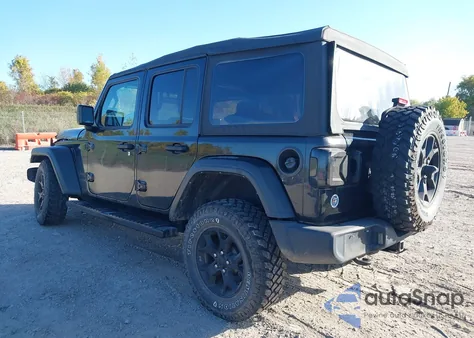 2022 Jeep Wrangler Unlimited Willys 4X4 z USA, uszkodzony, nr VIN 1C4HJXDG9NW164075